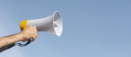 protester-holding-megaphone-demonstration.jpg -