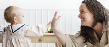 mother-baby-daughter-giving-high-fives-site.png -