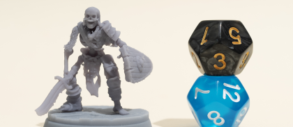 still-life-figurine-with-dices.png -